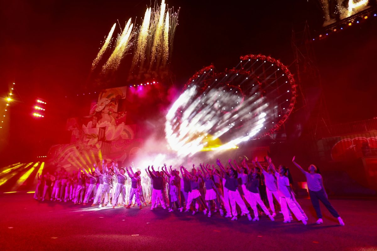 Performers on stage at a community celebration in Singapore